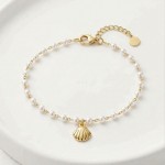 Pulseira pérolas pendente concha 